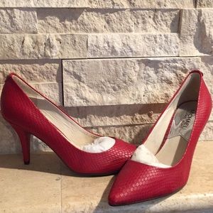 Textured red pumps